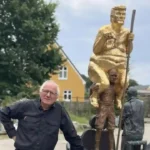 An 8.5-foot-tall golden, naked statue of Donald Trump titled 'The Orange Plague' displayed inside the European Parliament in Strasbourg
