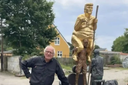 An 8.5-foot-tall golden, naked statue of Donald Trump titled 'The Orange Plague' displayed inside the European Parliament in Strasbourg